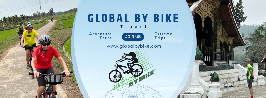 Global By Bike professional guides leading a cycling tour in Southeast Asia